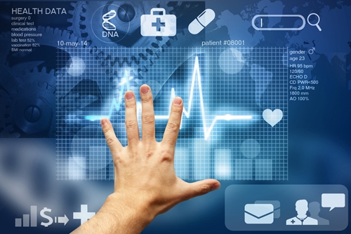 hand hovering over healthcare technology screen