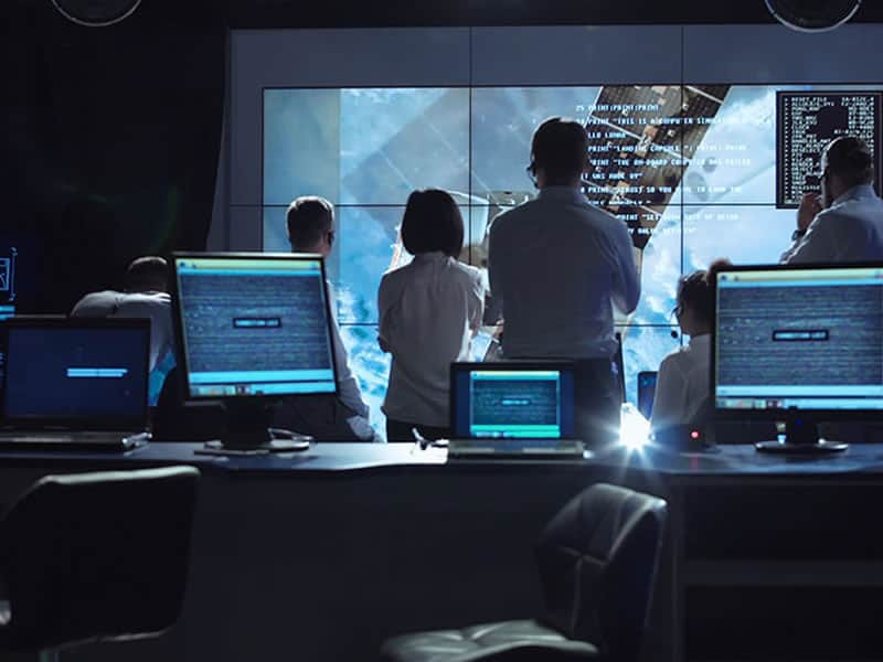 View of people working in mission control center