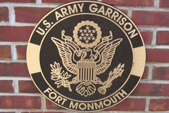 fort monmouth sign on brick wall