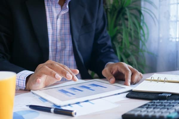 businessman looking at charts
